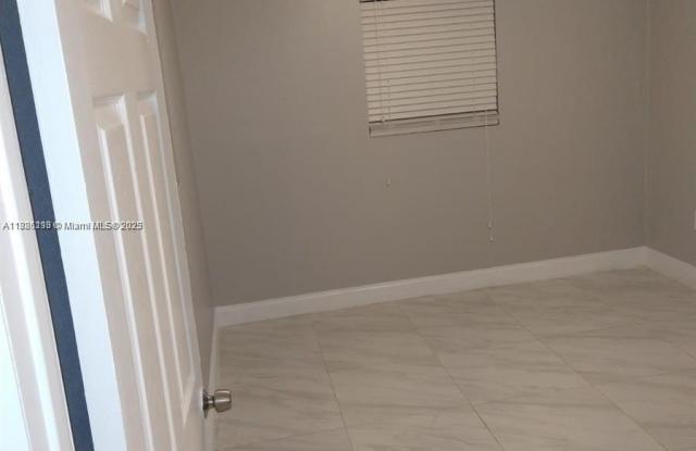 1275 NW 58th Ave photos photos