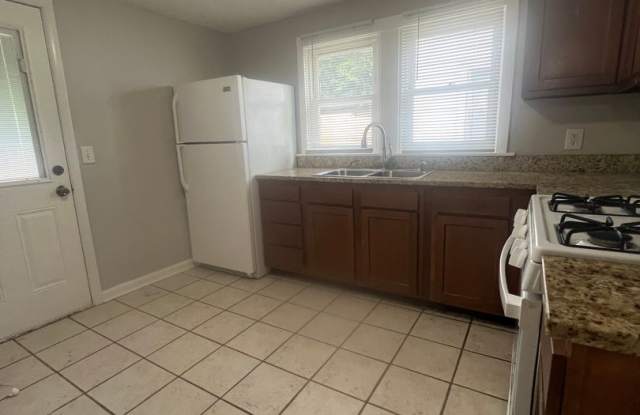 charming 2-bedroom, 1-bathroom home perfectly blends modern updates with bright, airy living Gallery 4