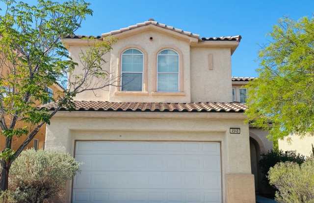 SPACIOUS OPEN FLOOR PLAN HOME WITH 2460 SQFT, LOCATED AT DECATUR AND BLUE DIAMOND. LAMINATED HARDWOOD FLOOR THROUGHOUT. MINUTES AWAY FROM SHOPPING CENTERS AND I-15! photos photos