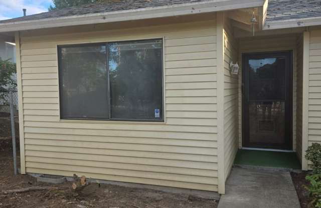 Centrally located 2 BR, 2 BA Duplex Unit with 1-car garage Gallery 2