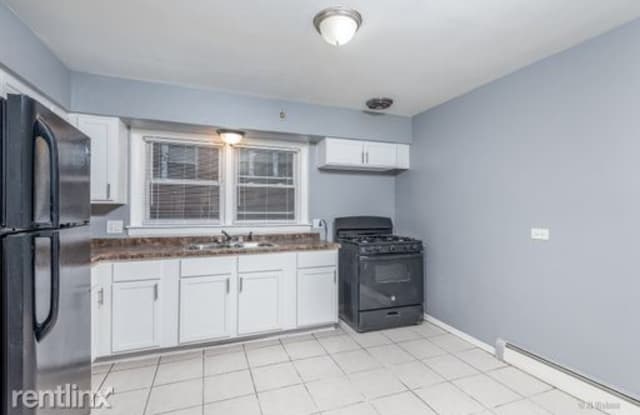 7034 S Cornell Ave - 7034 South Cornell Avenue, Chicago, IL 60649