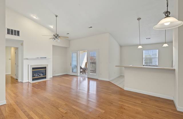Beautiful 2nd-Floor Condo with Vaulted Ceilings, Private Balcony & Attached Garage Gallery 1