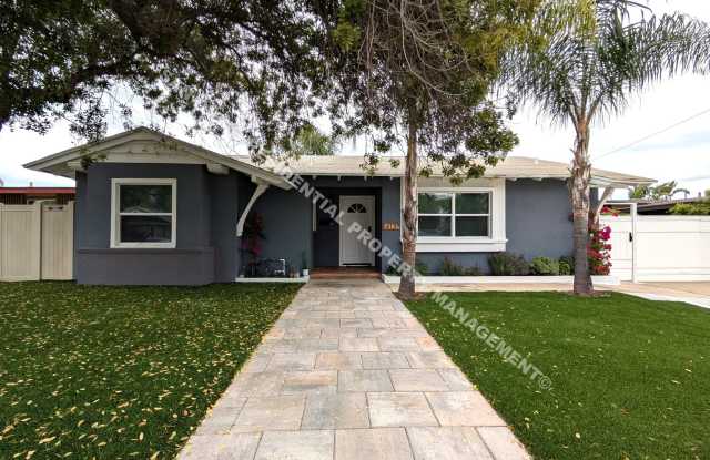 Beautifully Renovated 3BR/2BA Home with Sunroom  Spacious Backyard in Quiet Neighborhood photos photos