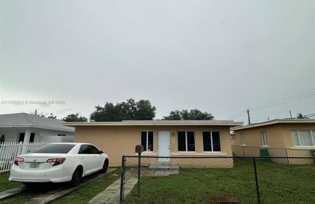 10150 NW 8th Ave photos photos