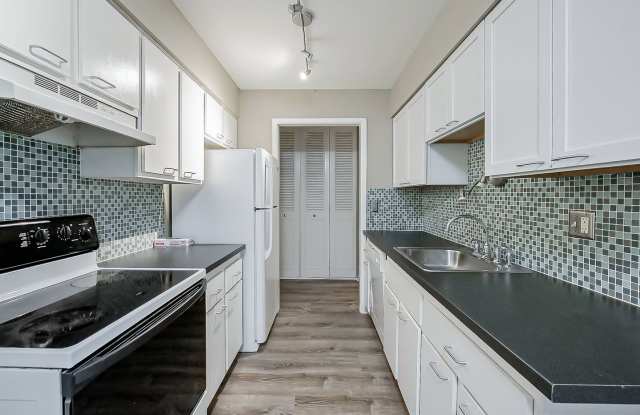 Charming 1-Bedroom Condo with Carport & Assigned Storage in Northville Gallery 4