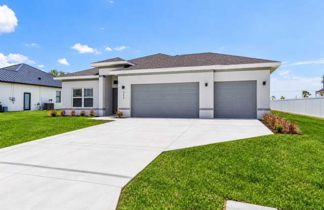 Stunning Nearly New 4-Bedroom Home in Cape Coral – 3-Car Garage, Luxury Upgrades & Modern Living! Gallery 3