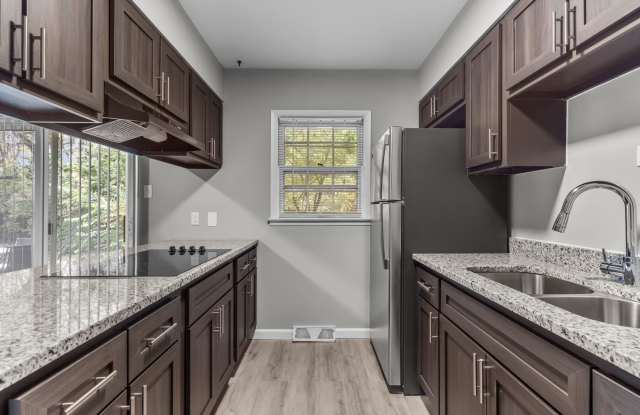 2 Bed Premium W/ Patio - GRANITE, Spacious, Natural Light, Basement! Gallery 2