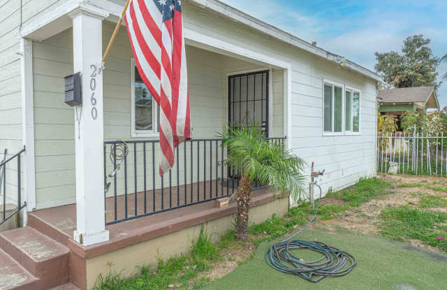 Cozy 4BR/1BA home with front yard photos photos