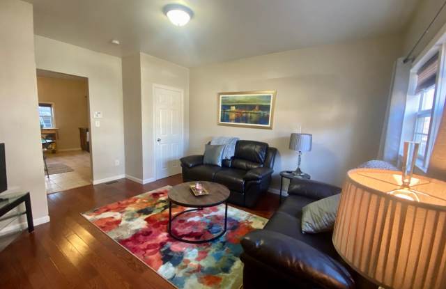 2 Bedroom Home on Pius St Available April 1- Parking included. Central Air. Washer and Dryer. photos photos