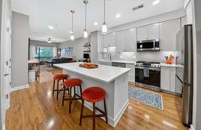 Stunning 1BR/ 1BA Condo with Den and Garage Parking in Downtown Silver Spring photos photos