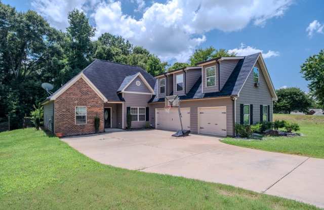 Spacious 3BR Home with Bonus Suite, Fenced Yard & 2-Car Garage Gallery 1
