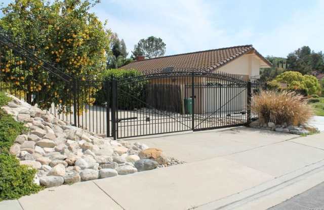 This incredible 4 bedroom single level home with private GATE  entry Gallery 3