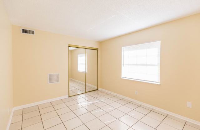 One-bedroom, one-bathroom Condo minutes away from the Mall at Millenia Gallery 4