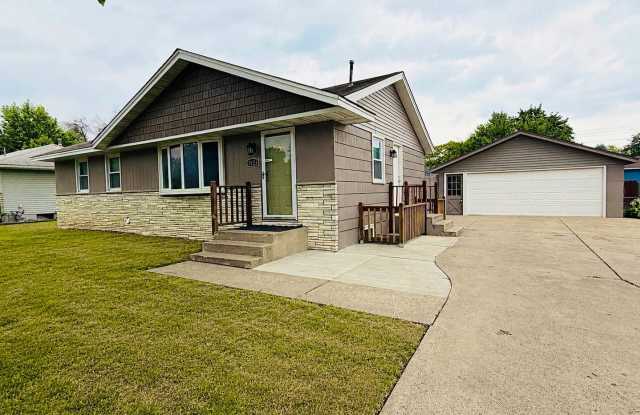 Newly Renovated 5BR/2BA Home with Finished Basement & Huge Fenced Backyard! photos photos