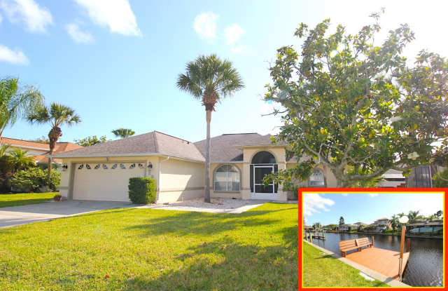 Roomy 3 Bed 2 Bath C Section Home w Dock on SALT WATER CANAL! photos photos