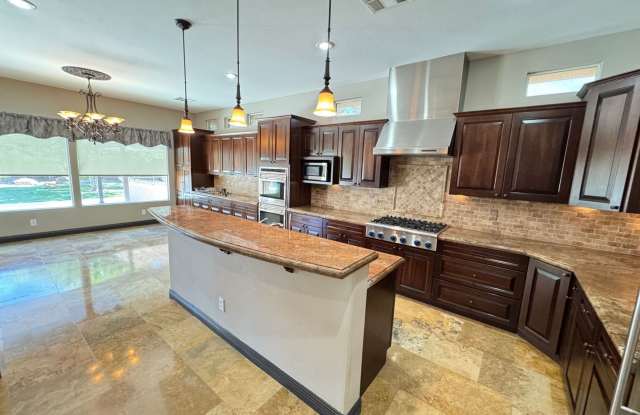 Elegant Desert Retreat – 3+ Bedroom Home with Pool in Mountain’s Edge photos photos