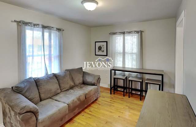 A 2-bedroom home with a 2-car garage plus driveway parking, and an in-unit washer and dryer Gallery 4