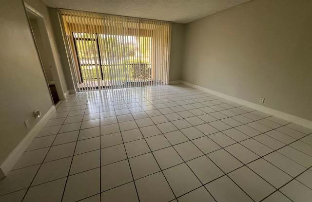 $ GREAT PRICED 2/2 IN CORAL SPRINGS $ Low Move In Costs - Call Today! Gallery 3