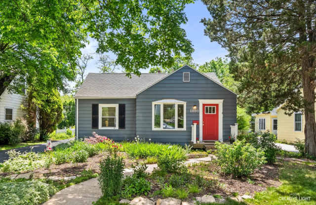 Charming Wheaton Cottage w/ Solar Panels, Finished Basement & 2-Car Garage photos photos