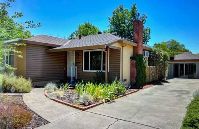 Storybook single family home in Tahoe Park, 2-3 Bedrooms, 1-1/2 Baths, Solar and more! photos photos