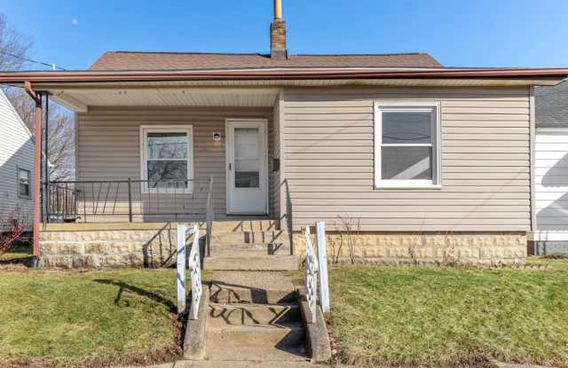 Move-in Ready 3BR/1BA with Garage, Deck & Large Basement! - 1904 Taft Ave NE Gallery 1