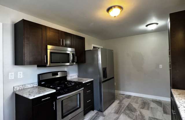 Available NW, Classic Charm, Updated Kitchen & a Fenced Backyard and 1-Car Attached Garage Gallery 1