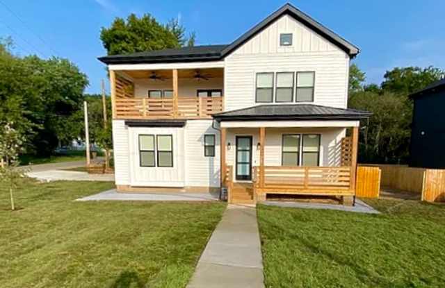 Modern 4‑Bedroom Home with Stylish Finishes  Great Location Near Downtown! photos photos
