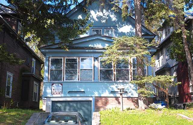Single Family Home with Enclosed Front Porch - Available 8/1/26 photos photos