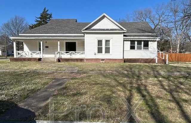 702 W 1st photos photos