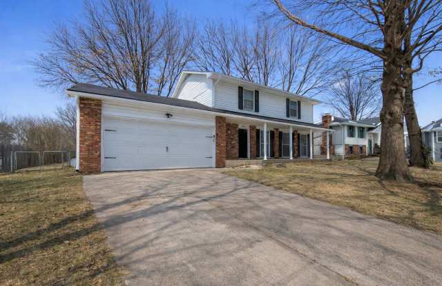 Spacious 4 Bed, 2.5 Bath Home with Fireplace  Garage in Independence, MO - 12618 East 41st Terrace South, Independence, MO 64055