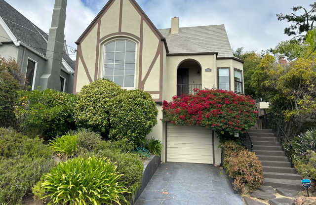 Oakmore Tudor with Large Backyard and Deck photos photos