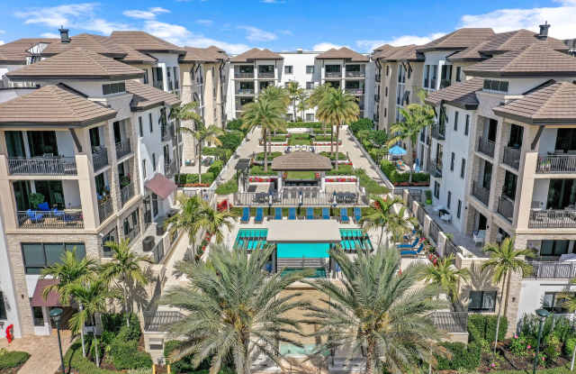 Luxury Living Meets Prime Location! Naples Square 2/2 Condo with Expansive Terrace photos photos