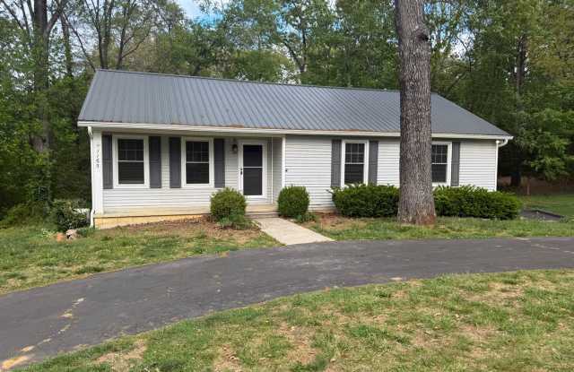 Spacious 3-Bedroom Home with Screened Porch, 2-Car Garage + Workshop photos photos