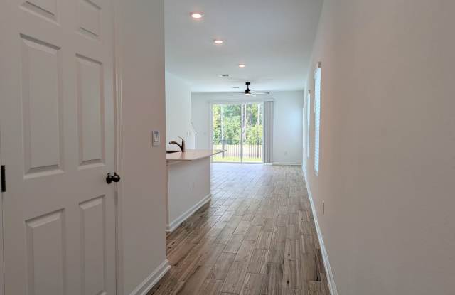 PRE-LEASING - NEW 2026 VILLA CONSTRUCTION!! 3/2.5/1 with premium finishes in the a new development community of in Hansen Creek - conveniently located just off I-295 and Lem Turner. Gallery 4