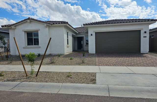 BEAUTIFUL NEW HOME 5 BEDROOMS 3 BATHS! - 14183 West Soft Wind Circle, Surprise, AZ 85387