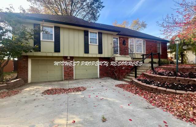 Spacious 4-Bedroom, 3-Bathroom Home with Fenced Yard and Bonus Spaces! - 803 Northeast Mulberry Street, Lee's Summit, MO 64086