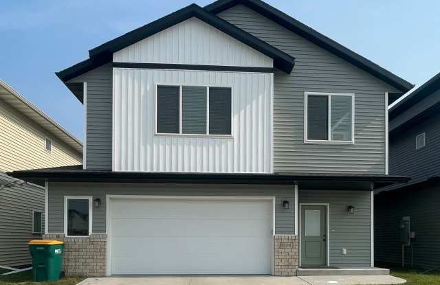 4-bedroom, 3-bathroom West Fargo Single-Family Home w/ 2 Stall Garage photos photos