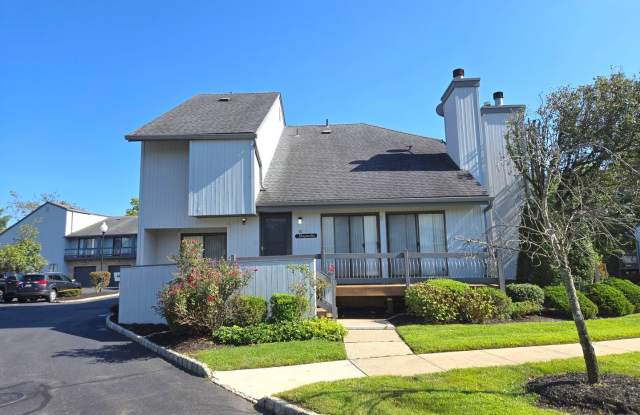 Spacious, freshly painted end-unit townhouse with finished basement ( bonus room) garage AND reserved parking! photos photos