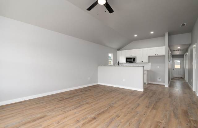 Spacious 3 Bedroom Home Located Less Than 15 Minutes from Stargate with Beautiful Modern Finishes Throughout photos photos