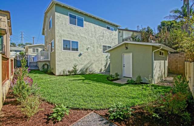 NEWLY REMODELED, SPLIT-LEVEL 3BR2BA DUPLEX W/ OCEAN VIEW, SPACIOUS YARD/PATIO  LARGE 2-CAR GARAGE ON QUIET STREET JUST BLOCKS TO SCHOOLS, PARK, SHOPPING  BEACH! photos photos