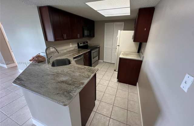 5005 Wiles Road 104, Coconut Creek, FL 33073 photos photos