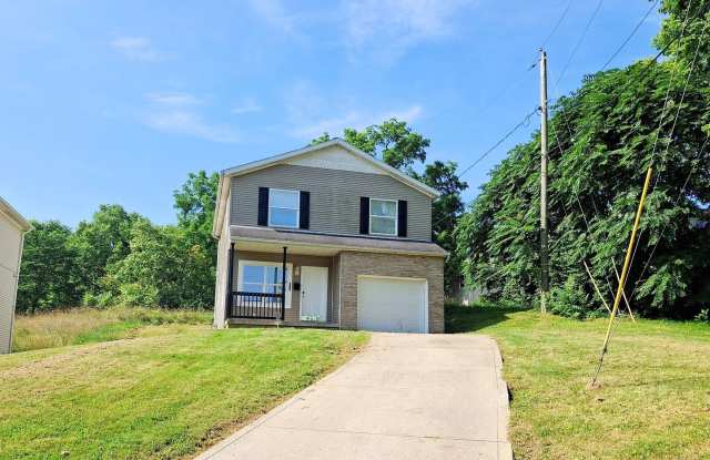 4 Bed / 2 Full Bath House with Brand-New Kitchen, Attached Garage, and Full Basement - Built 2001 photos photos