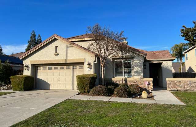 Well-appointed single-story home located walking distance to Manteca's Woodward Park! photos photos