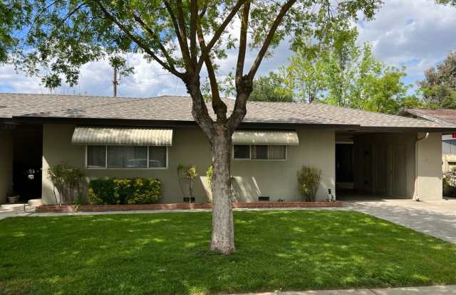 Two-bedroom single story unit with a carport! photos photos
