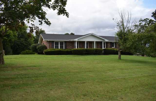 Situated in the heart of Sango, massive lot, and includes a fully finished & recently remodeled basement. Gallery 1
