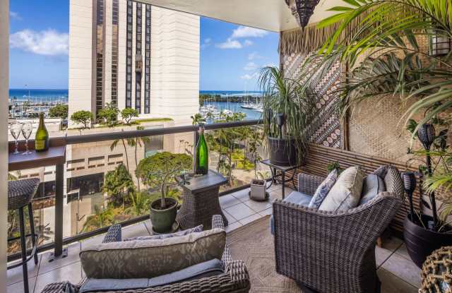 Live the ultimate Honolulu dream in this modern furnished, Hawaiian-style tiki condo! Gallery 1