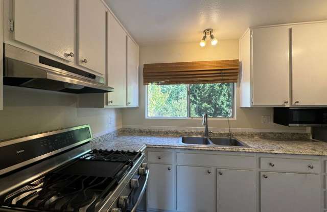 55+ Community! Beautifully Updated 2BR Home with Bonus Room & Private Yard in Peacock Hills Gallery 3