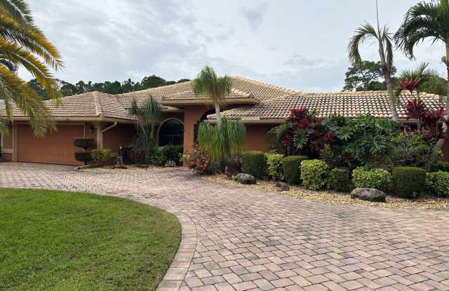 Tranquil Lakefront Living in the Heart of Port St. Lucie with Pool! photos photos