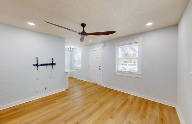 Charming 3-bedroom, 1-bathroom beachside bungalow available for rent in the heart of Jacksonville Beach. photos photos