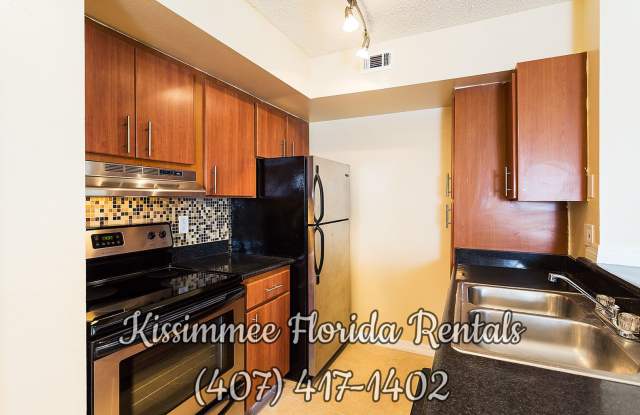 Beautiful two (2) bedrooms and two (2) bathrooms second floor unit in a gated community in the heart of Kissimmee photos photos